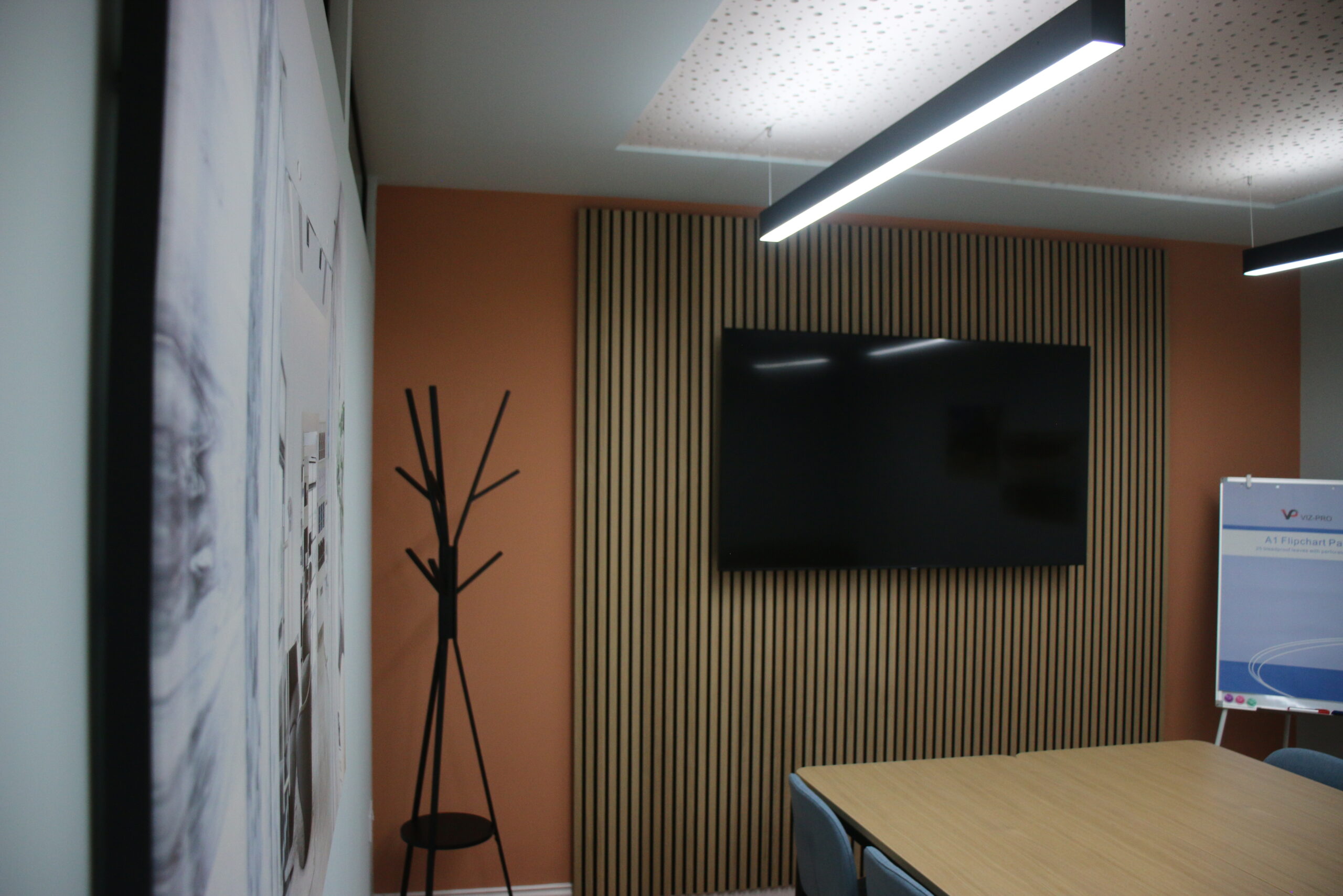 Meeting room in Banbury. Seats 10 people with TV on the wall.